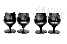 Set of 4 Polaris chairs by Pierre Guariche in black leatherette