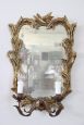 Pair of gilded wall lights with antique style mirror