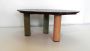 Oval coffee table with top in green Alps marble and legs covered in alcantara