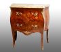 Small antique Napoleon III chest of drawers in polychrome woods with marble top                
                            