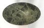 Oval coffee table with top in green Alps marble and legs covered in alcantara