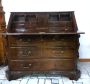 Antique chest of drawers with drop-down top, Louis XVI period, in veneered walnut