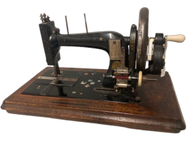 Antique Clemens Müller sewing machine from the late 19th century with mother of pearl                        
                            