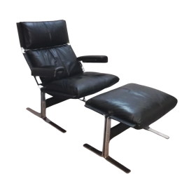 Lounge armchair with ottoman designed by Richard Hersberger in black leather, 1970
