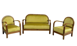 Art Deco living room with mustard yellow velvet sofa and armchairs
