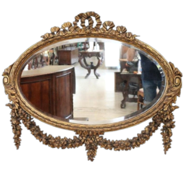 Antique Louis XVI style oval mirror in gilded wood                          
                            
