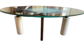 Tavolo design ovale con piano in vetro e gambe in pietra, anni '80                            