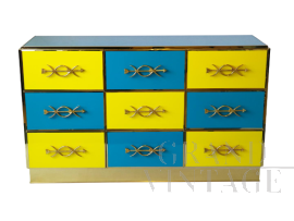 Design chest of drawers with 9 drawers in yellow and blue glass