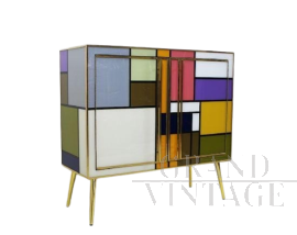 Vintage 1970s dresser covered in colored glass