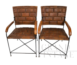 Pair of hand-crafted leather chairs