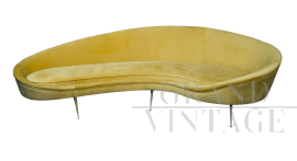 Vintage yellow sofa with a shaped line