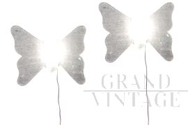 ITre glass sconces in the shape of a butterfly