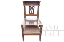 Antique kneeling chair from the 19th century