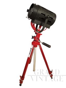 Small vintage cinema spotlight with tripod