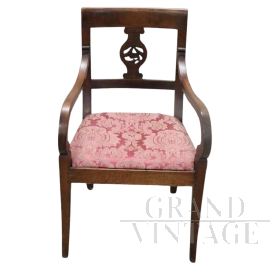 Antique Directoire armchair from the end of the 18th century in carved walnut