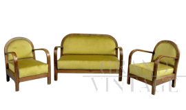 Art Deco living room with mustard yellow velvet sofa and armchairs