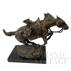 Patinated bronze sculpture depicting a horse