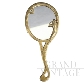 Hand mirror in golden brass, circa 1980s    