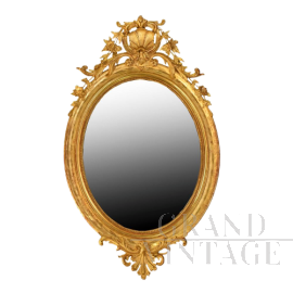 ANTIQUE OVAL MIRROR WITH GOLDEN FRAME, 19th CENTURY.