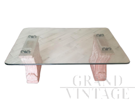 Vintage low coffee table with sculpted pink granite legs and glass top