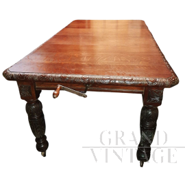 Antique Victorian hand crank extendable table with carvings