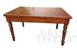 19th century extendable table with turned legs