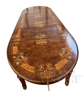 Palladian crank-extendable table with inlays of flowers and musical instruments