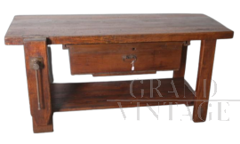 Antique carpenter's bench from the 19th century in solid elm