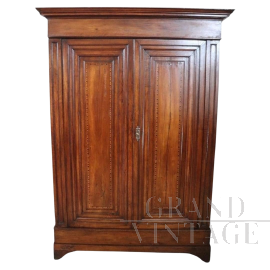 Antique Charles X wardrobe in carved solid walnut, 19th century 