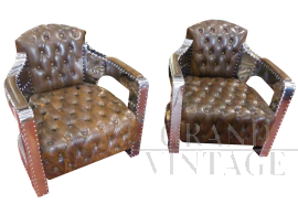 Pair of aviator model armchairs in leather and steel