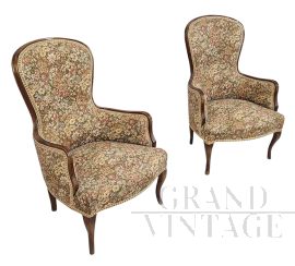 Coppia di poltrone vintage in legno rivestite con tessuto floreale                            