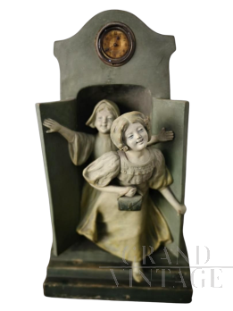 Late 19th century terracotta sculpture with little girls and clock    