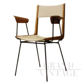 Sedia design Boomerang con i braccioli                            