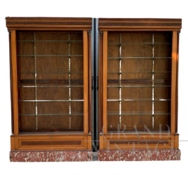 Early 1900s display cabinets with bronzes and marble base