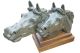 Horse heads sculpture, signed