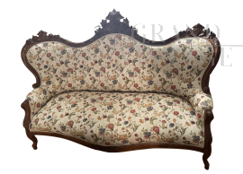 Divano antico intagliato in tessuto floreale                            