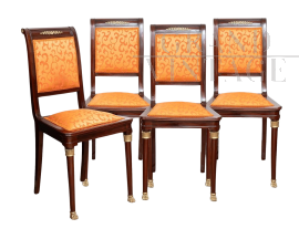 Set di quattro sedie antiche in massello di mogano con innesti in bronzo                            