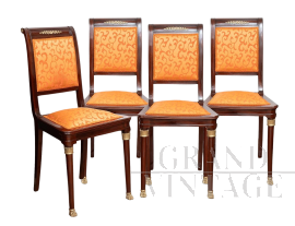 Set di quattro sedie antiche in massello di mogano con innesti in bronzo                            