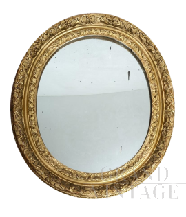 Specchio ovale antico Luigi XVI Francese in legno dorato e intagliato                            