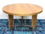 Mid-century round table in wood and steel with three legs