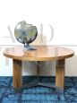 Mid-century round table in wood and steel with three legs