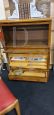 Small vintage bookcase with retractable doors