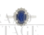 Gold ring with oval sapphire and diamonds                            