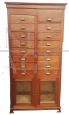 Vintage office chest of drawers with 16 drawers and two glass doors              