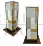 Decorative columns in brass and glass        