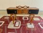 Art Deco console in walnut briar and ebonized wood