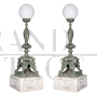 Pair of bronze outdoor lamps with Roman style sculptures on marble base