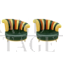 Pair of multicolored round design armchairs with asymmetrical backrest