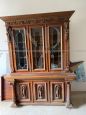 Living room set with buffet & hutch cupboard and a sideboard, all carved with statues