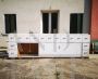 Large industrial sideboard in white lacquered wood, with doors and drawers